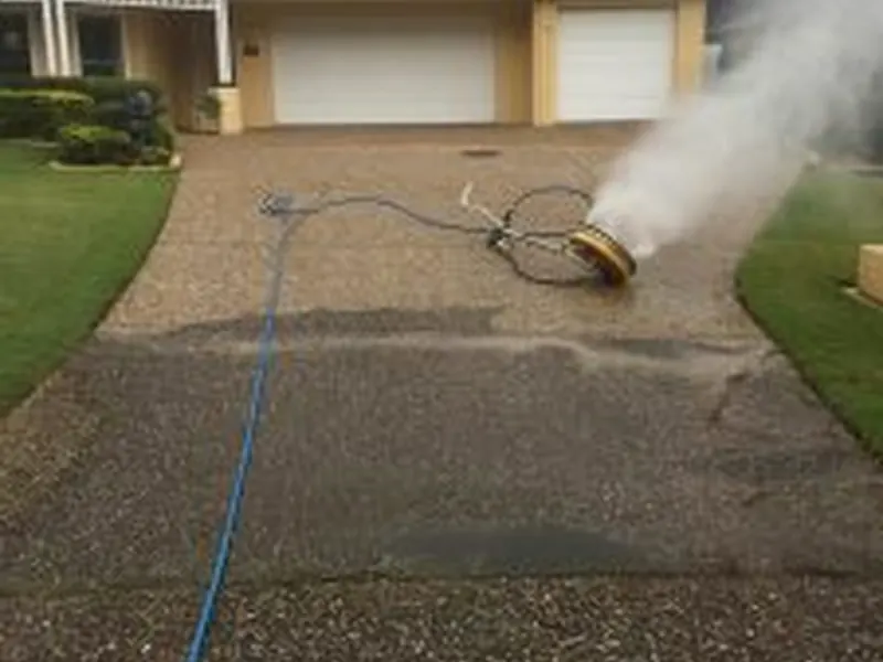 Waterworx set up for a house wash on a driveway